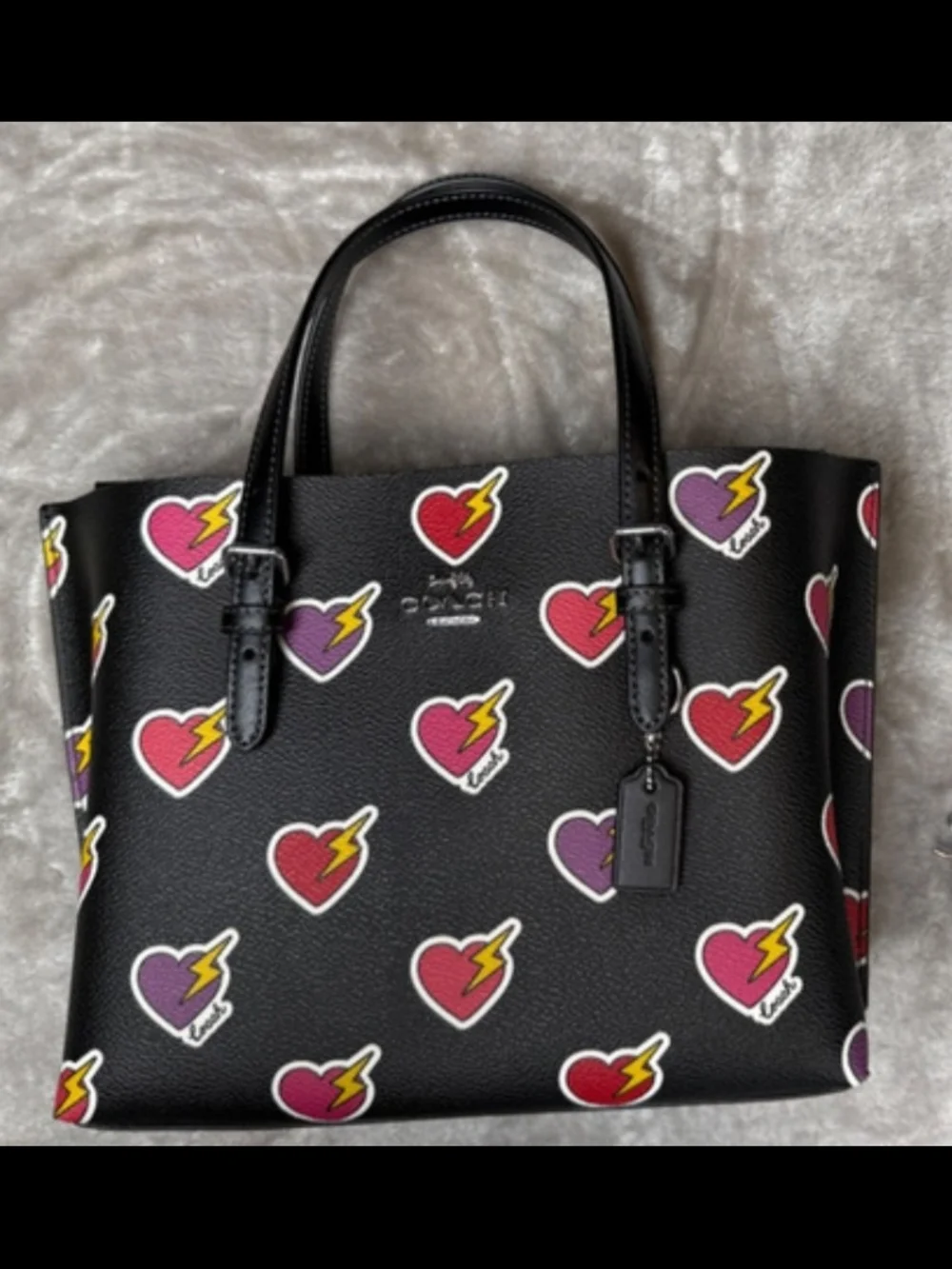 Coach Black Tote with Multicolor Heart Bolt Print